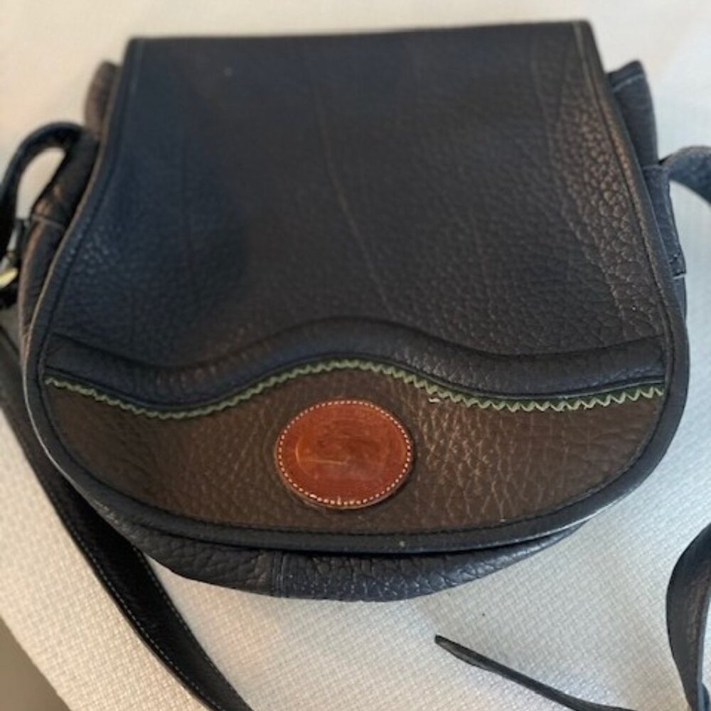 Vintage Dooney and Bourke Teton Saddle Flap bag in Navy Blue